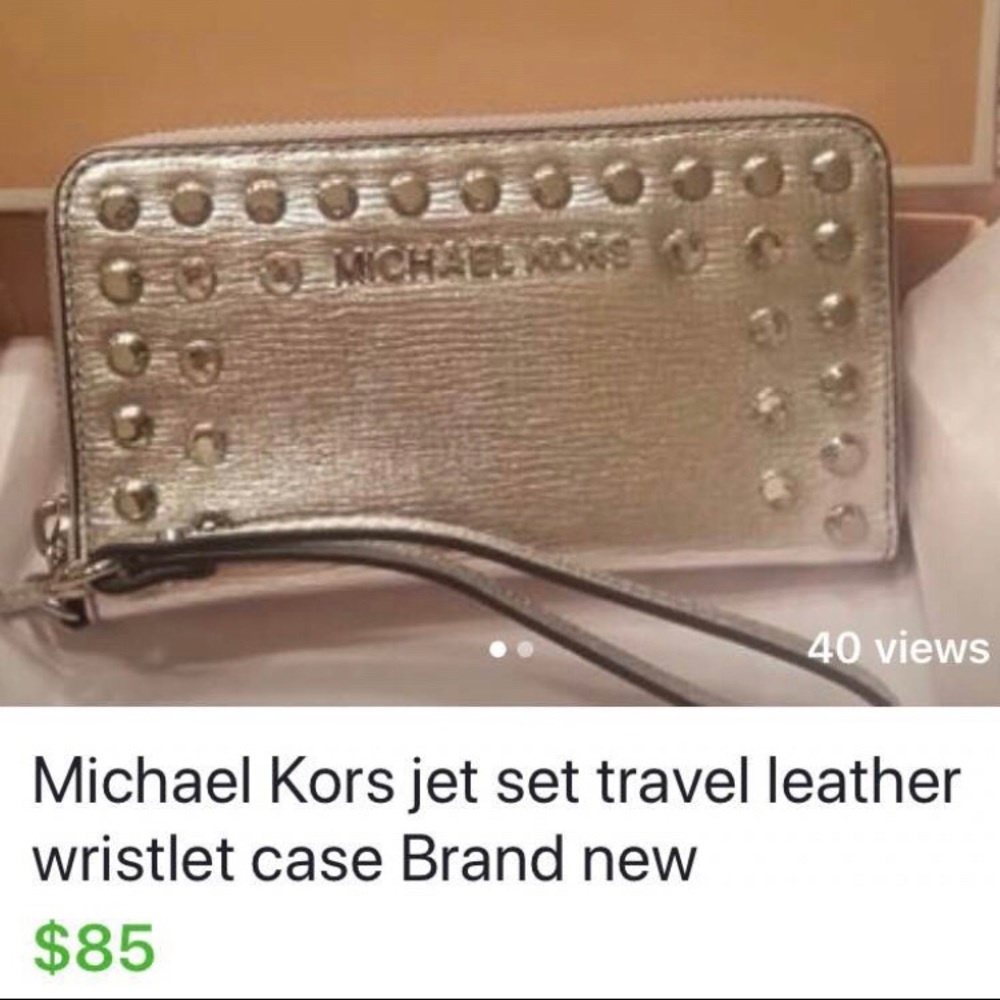 Michael Korrs metallic detachable wristlet